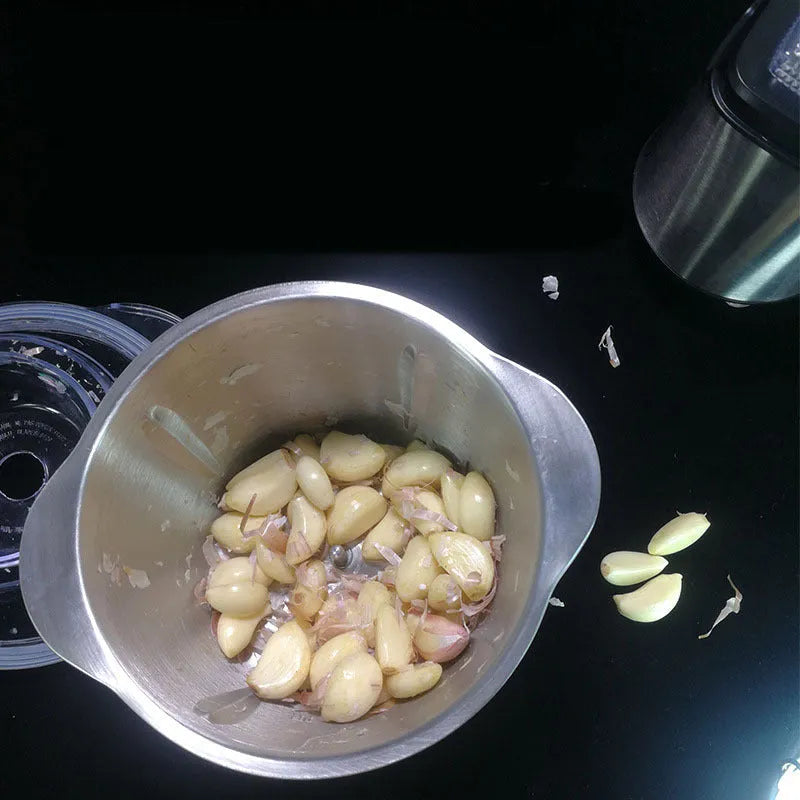 LONG PLUS white electric meat grinder and garlic peeler appliance on a kitchen counter