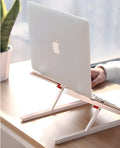 White portable laptop cooling stand with adjustable height and folding mechanism