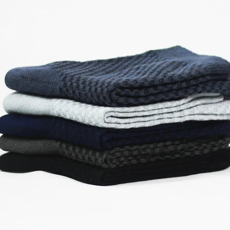 A pair of men's bamboo fibre ankle socks with a small square pattern, shown in one of the five available colours.