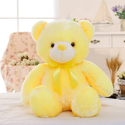 Colorful light-up plush teddy bear with over 7 changing LED colors, a cozy and unique Christmas gift for kids