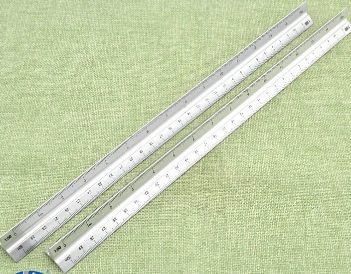 30cm silver metal architect technical triangle ruler on white background