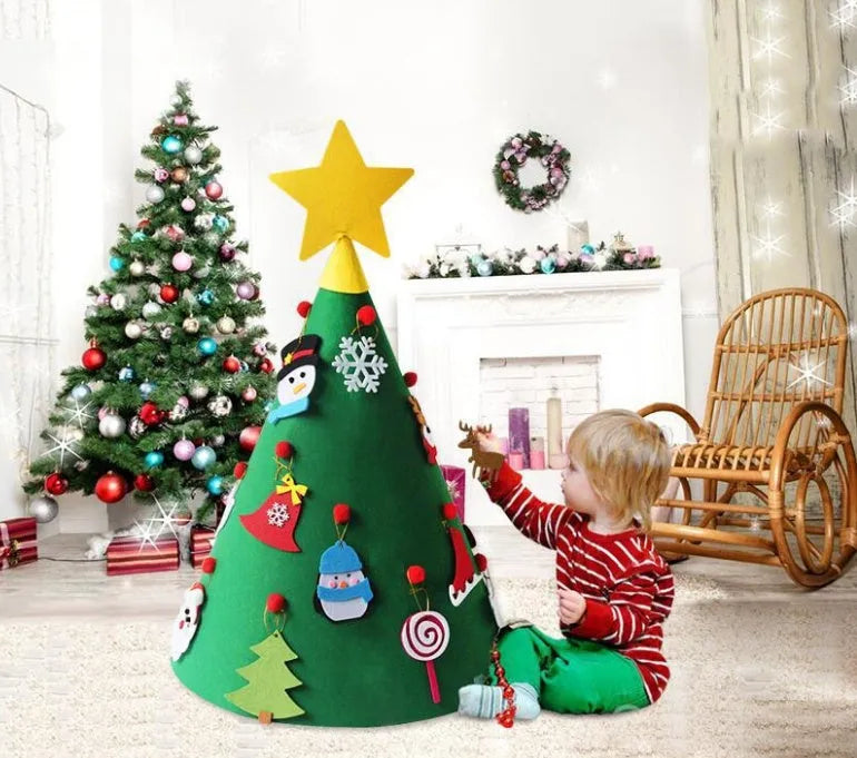 Felt Christmas tree three-dimensional DIY puzzle kit with cone base and felt balls on a surface