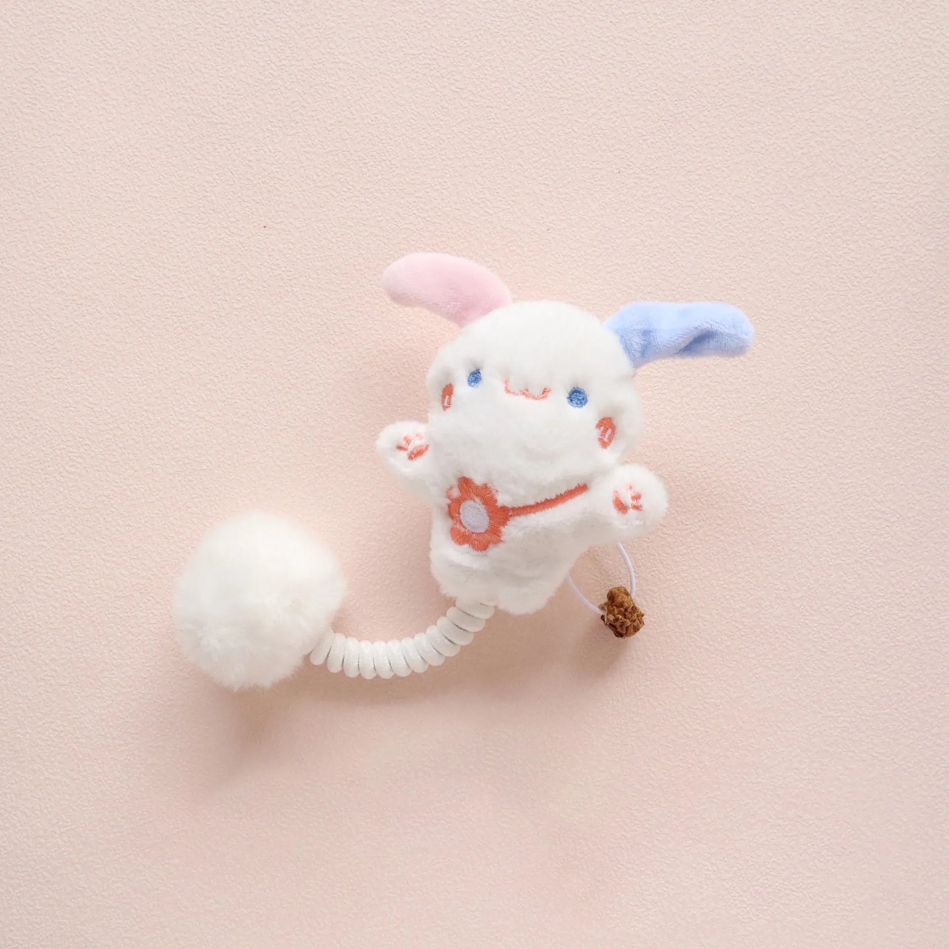 Set of interactive cat toys including plush animals, a silvervine fruit, a spring, and a fuzzy ball.