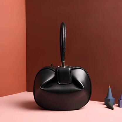 Women's cowhide leather tote bag in tramp shape with single handle and buckle, available in apricot, black, and other colours, big size 35cm x 40cm