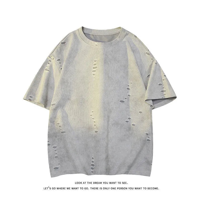 Men's grey loose-fit cotton blend short sleeve t-shirt with a distressed design on the front.