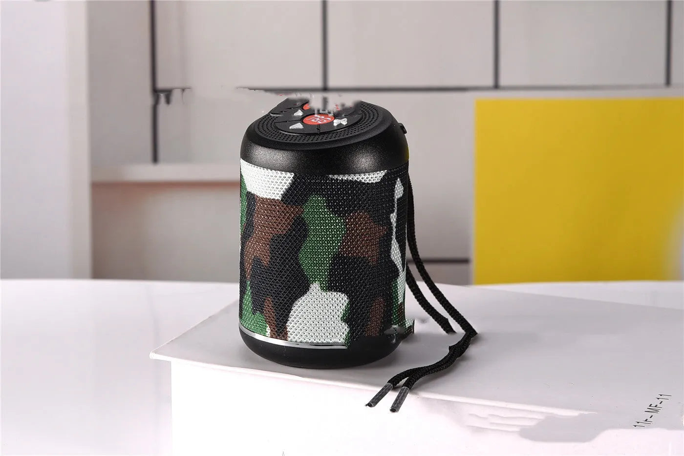 Portable outdoor Bluetooth subwoofer in six colour options with built-in battery and multiple audio functions