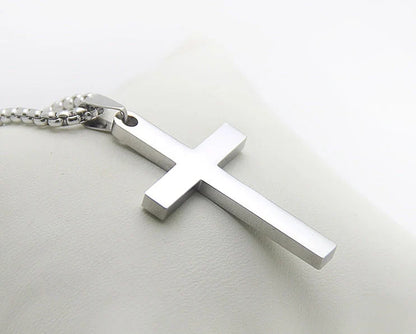 Simple stainless steel cross necklace with adjustable chain, perfect for everyday wear