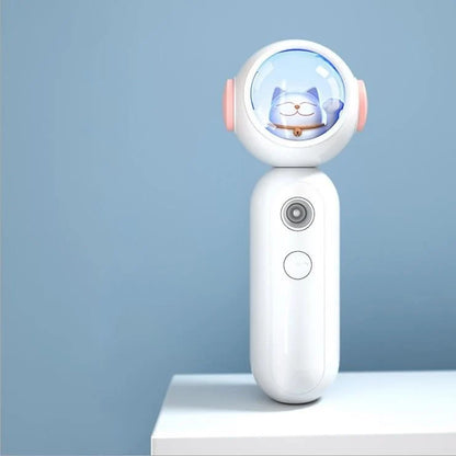 Handheld nano spray steamer in cat pink, cat white, and alien red for skin hydration