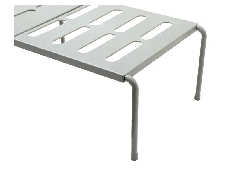 White telescopic plastic kitchen rack at extended height with ground installation