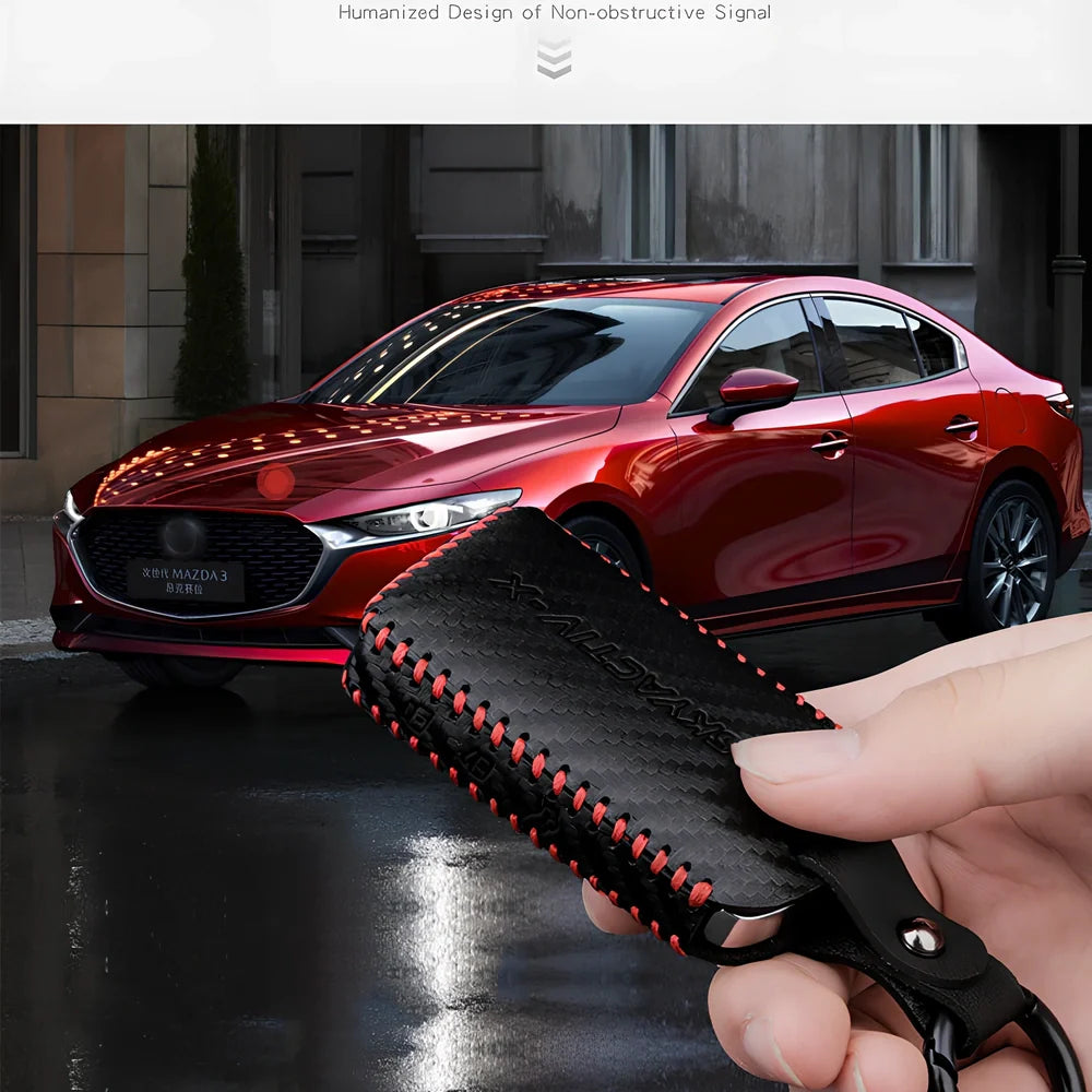 Black Angkesaila leather key case with 3D carbon fibre pattern and red stitching, 10 cm size for fob protection