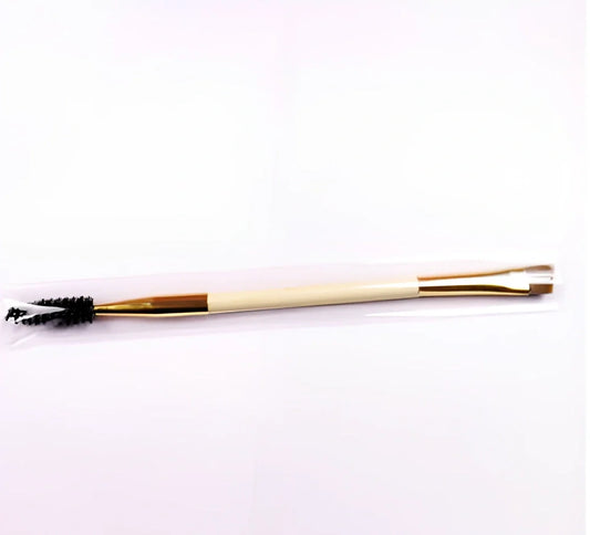 Double-ended eyebrow brush with bamboo handle and golden tube, rayon bristles for precise application and spiral head for blending brows and lashes