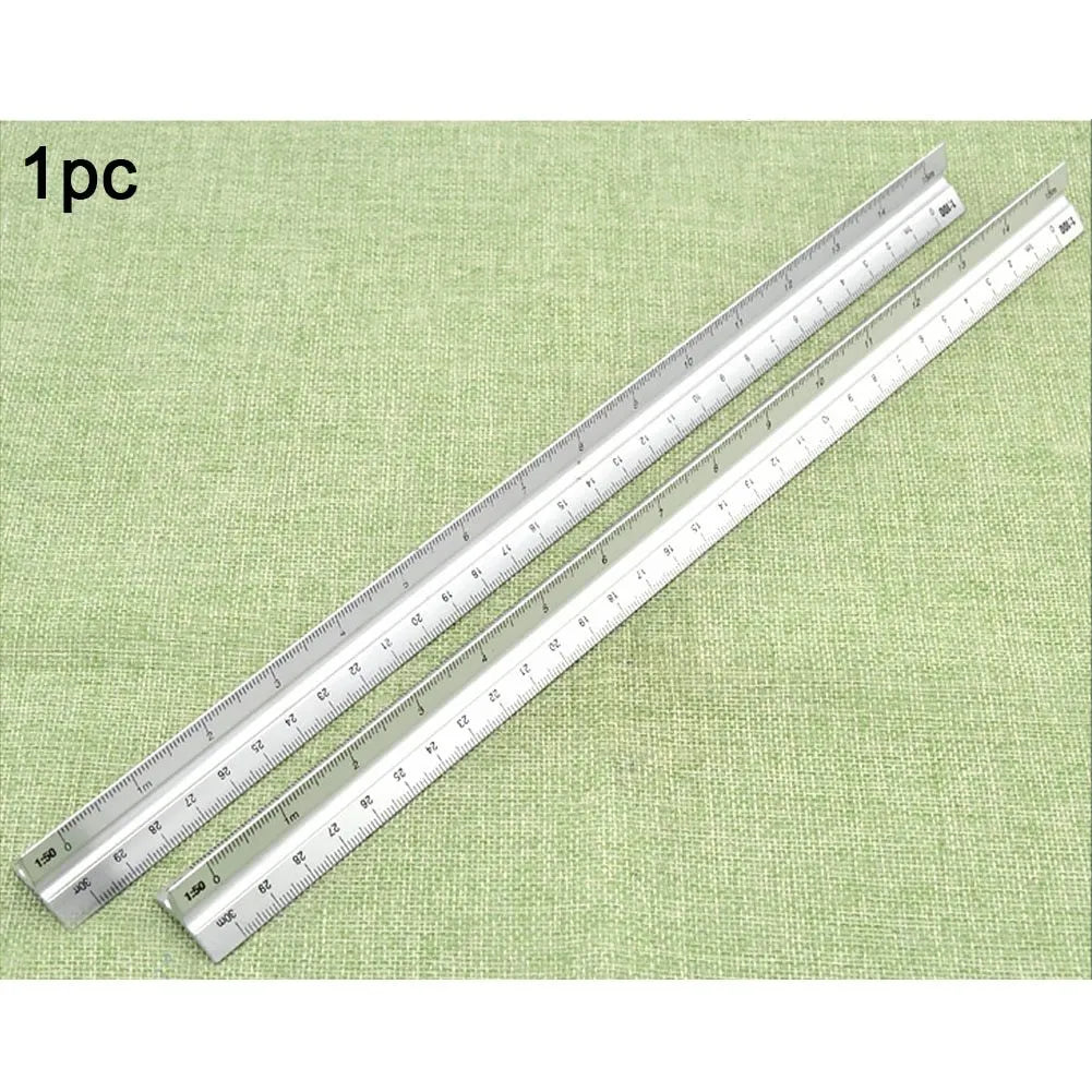 30cm silver metal architect technical triangle ruler on white background