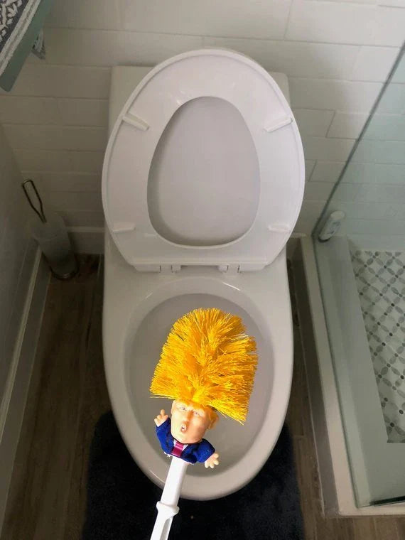 Bright yellow Trump-themed toilet brush with hanging slot