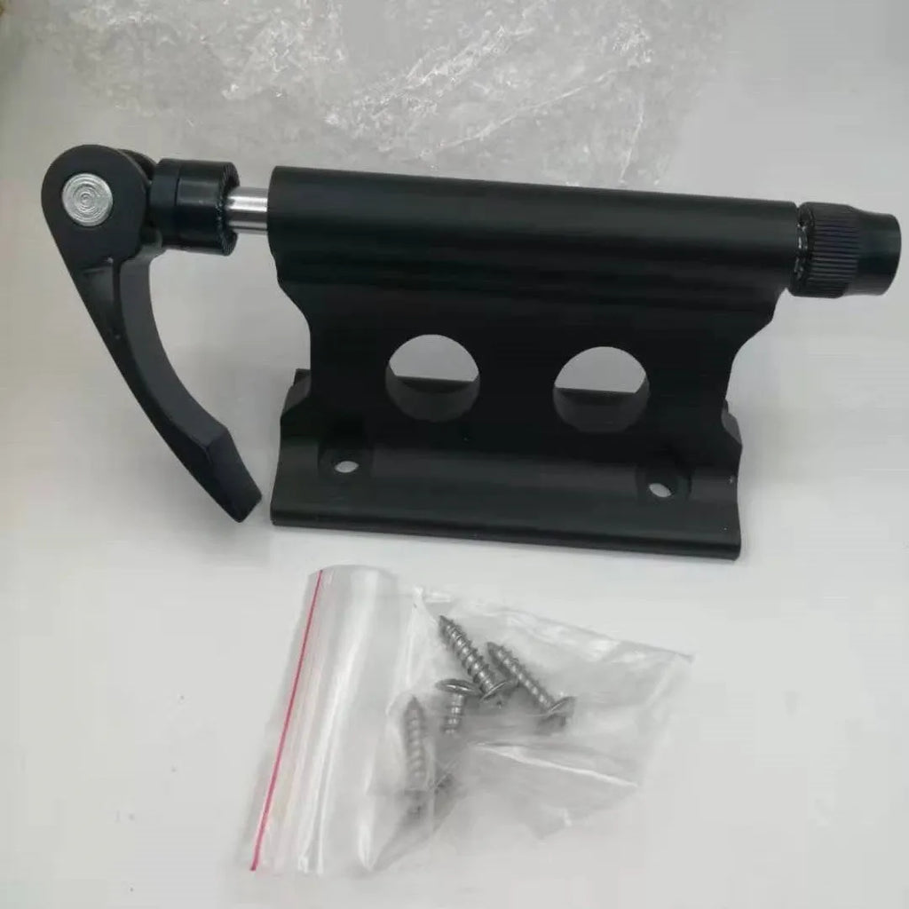 Silver metal quick release fixing clamp for mounting accessories on a bicycle front fork.