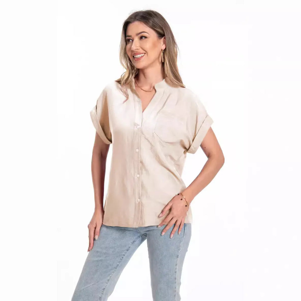 Women's loose summer top with stand collar and button front in polyester fabric with raglan sleeves