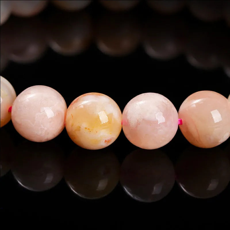 Natural cherry agate sweet style bracelet with geometric round beads in three purity sizes