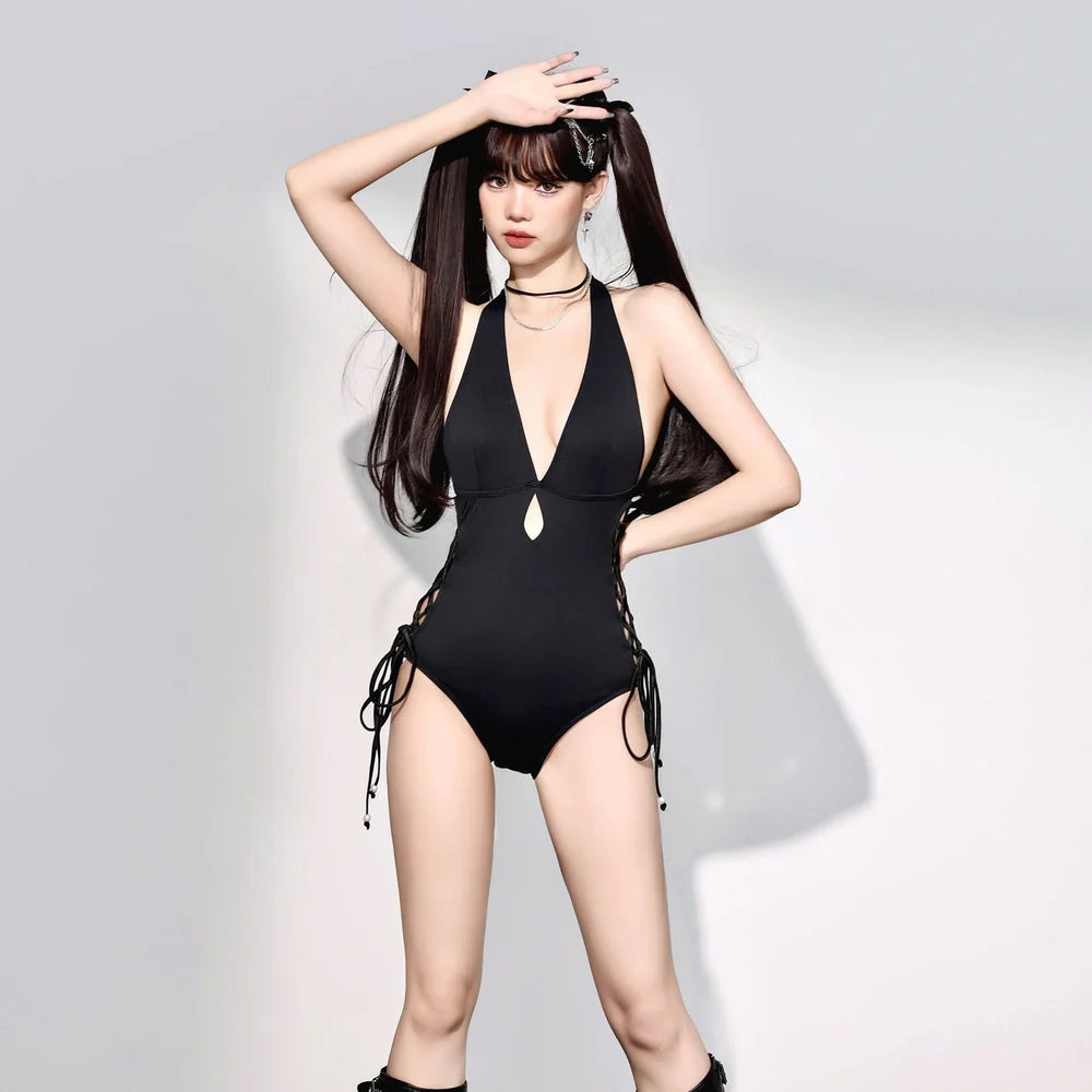 Black women's one-piece swimsuit with V-neck design and hollow straps, polypropylene fibre fabric