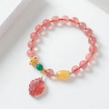 Women's strawberry quartz crystal beaded bracelet with magnetic clasp in a Nine Tail Fox design.