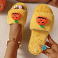 Halloween pumpkin cartoon plush slippers with synthetic fur upper and PVC sole in white or yellow