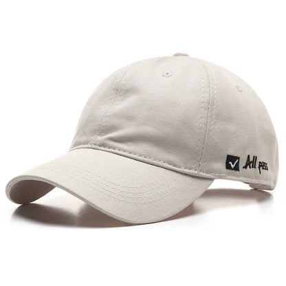 Adjustable cotton baseball cap with side letter embroidery in multiple colours