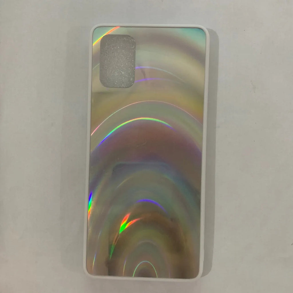 Marble pattern silicone phone case for Samsung Galaxy smartphone on a table.