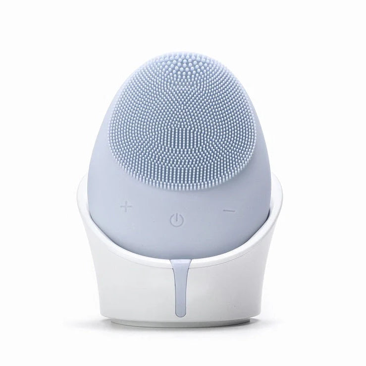 Silicone facial cleansing device with wireless charging base in multiple colours