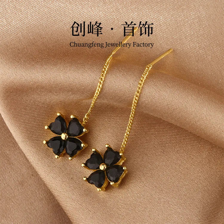 Copper clover leaf hanging earrings for women, A203 style, leaf shape on white background