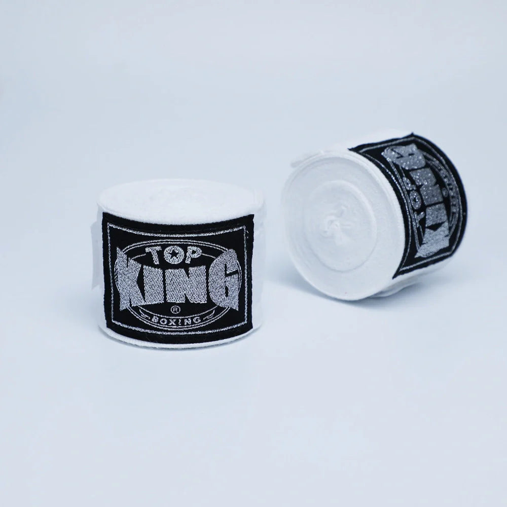 Two 5-metre boxing hand wraps in different colours showing elastic cotton construction