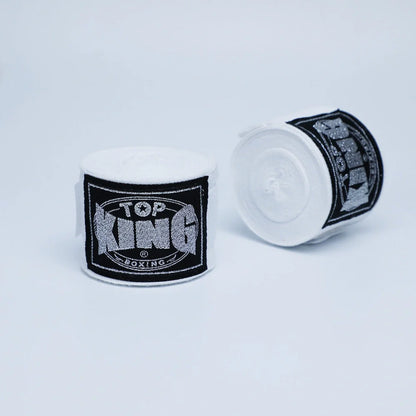 Two 5-metre boxing hand wraps in different colours showing elastic cotton construction