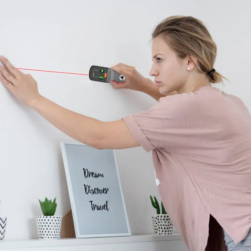 Red hammer drill dust collector accessory with integrated laser level and mounting bracket.