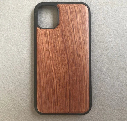 Wooden mobile phone case showing natural grain texture with iPhone 15 compatibility