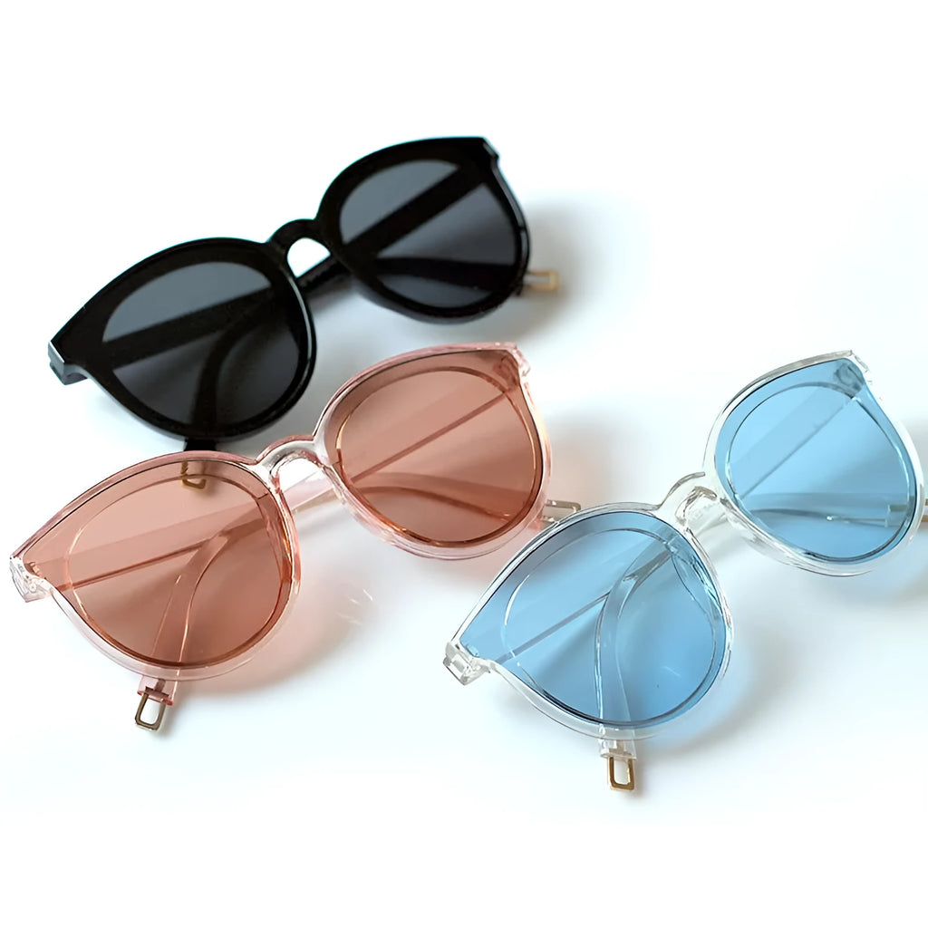 Unisex reading glasses with spring hinge temple in six colours including black, blue, brown, pink, red, and yellow