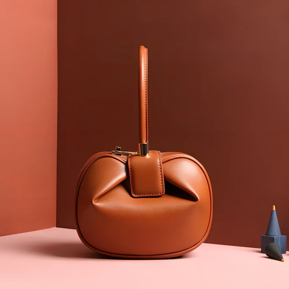 Women's cowhide leather tote bag in tramp shape with single handle and buckle, available in apricot, black, and other colours, big size 35cm x 40cm