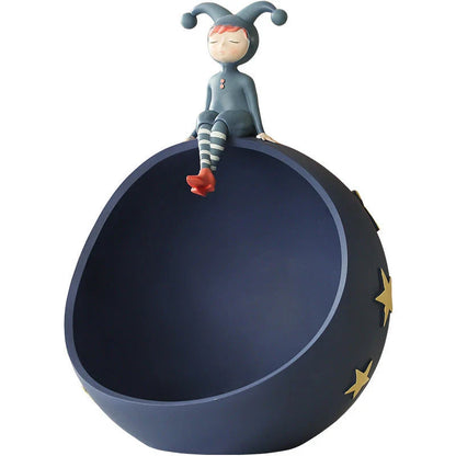 Hand-painted resin elf girl sculpture ornament with vibrant orange detailing