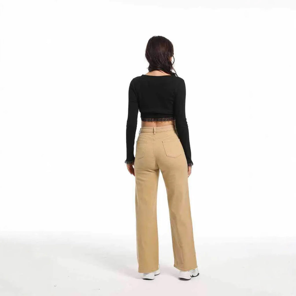 Women's straight leg jeans in apricot colour with high waist and wide leg trousers cut