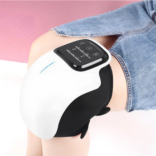 Smart knee massager with adjustable straps and LED display showing intensity levels