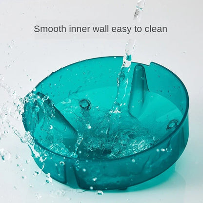 Eco-friendly disposable pet food bowl in malachite green and Tango Orange with non-slip base