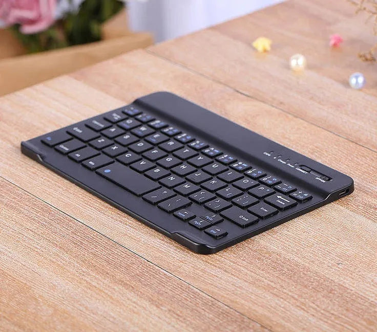 Wireless Bluetooth mini ultra-thin keyboard for laptop, available in black and white, with plug-and-play support