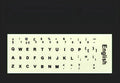 Yellow PVC keyboard stickers with glowing multilingual characters for desktop and laptop computers