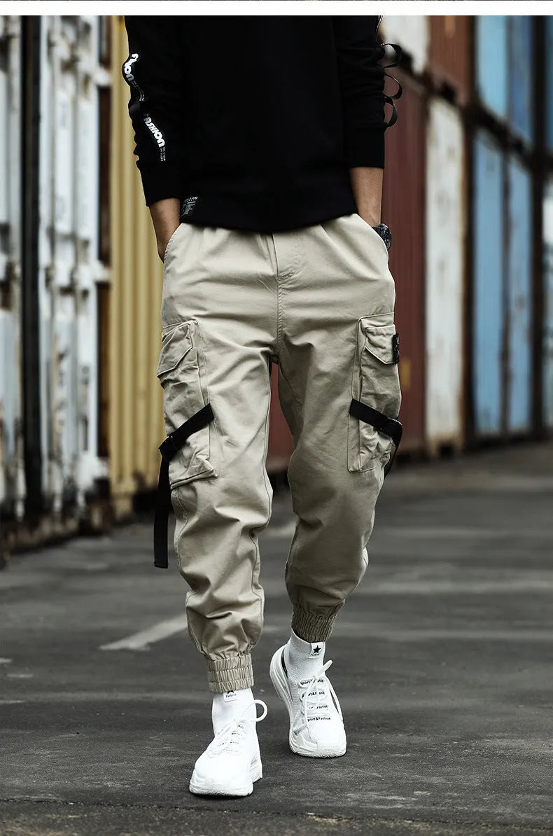 Men's casual cotton cargo pants in black with multiple pockets, available in Asian sizes S to XL