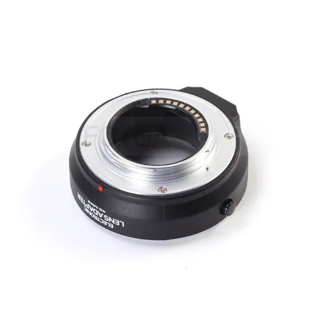 Black electronic adapter ring for Olympus 4/3 lenses to Micro Four Thirds cameras with metal bayonet