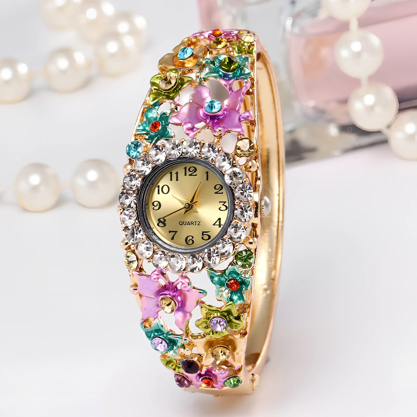 Small round flower diamond ladies bracelet watch, 20mm diameter, 10mm thick, alloy strap in gold colour with mineral glass mirror