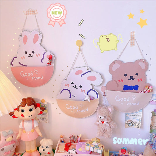 Wall hanging storage bag in beige bear and yellow rabbit designs, 22.5cm by 35cm