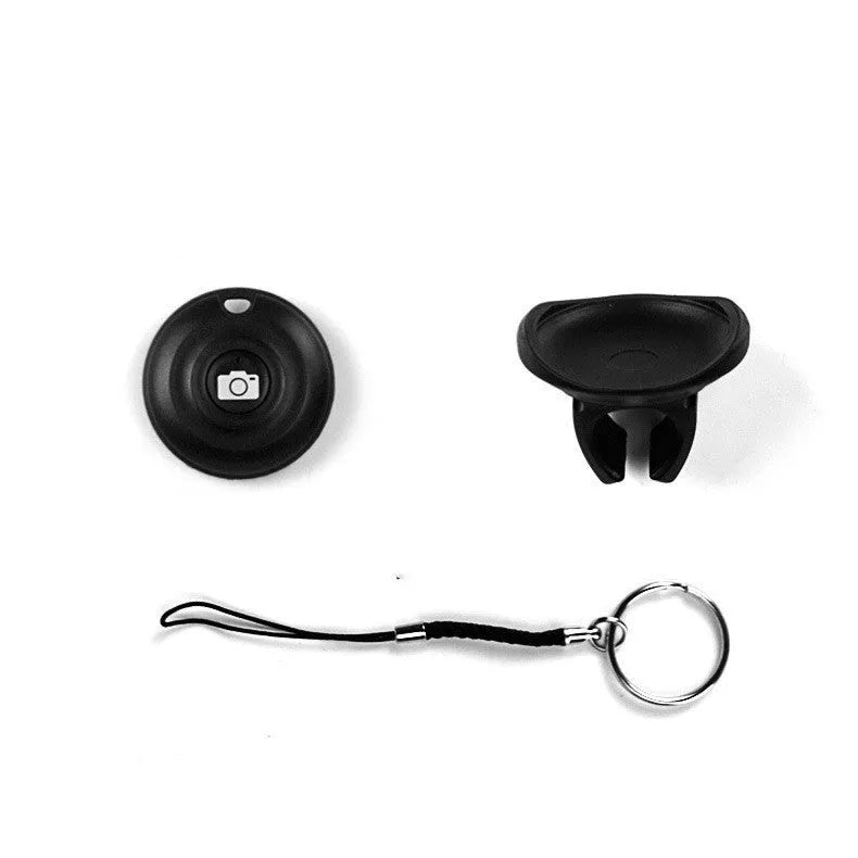Black Snap Bluetooth remote control for wireless camera shutter and selfie triggering.