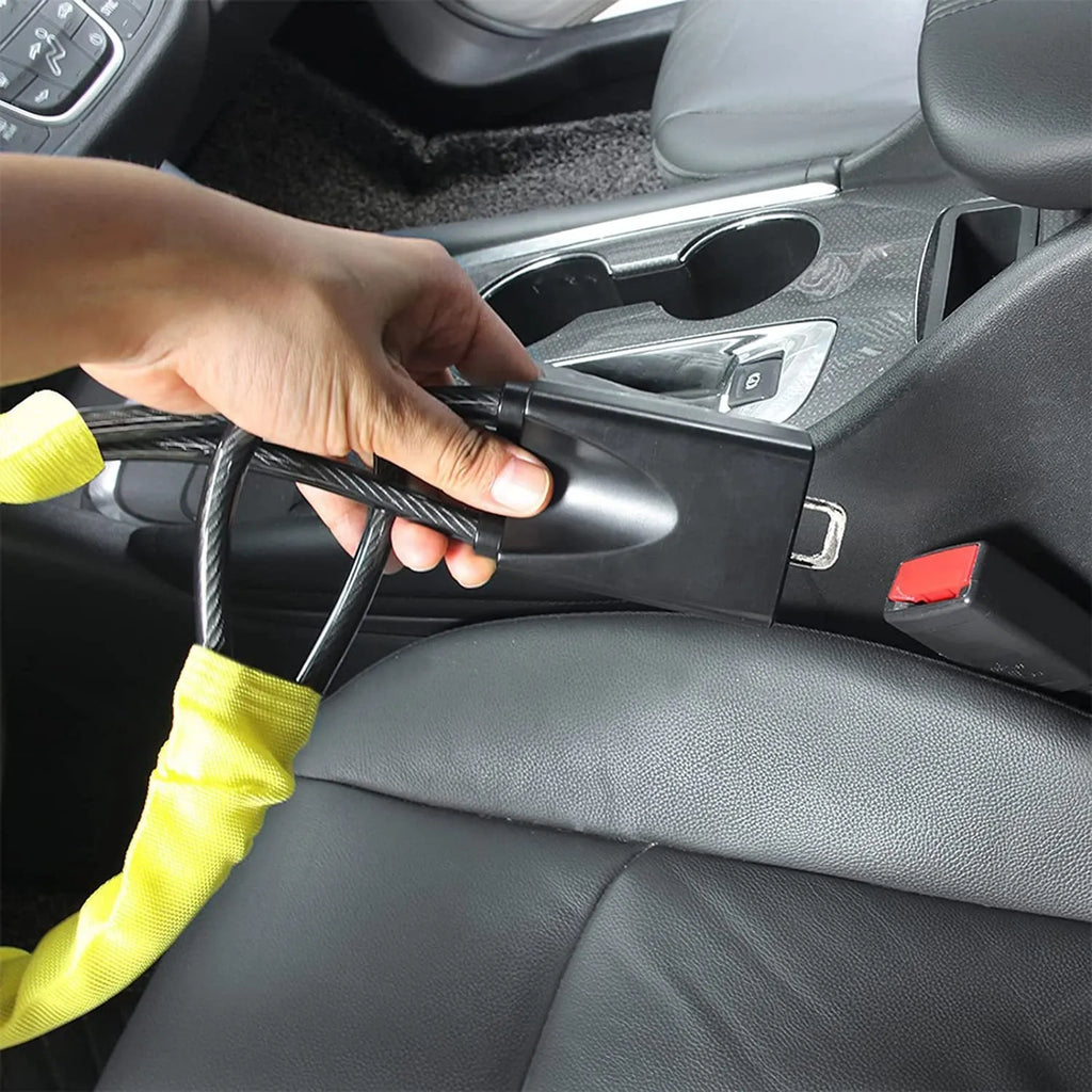 Red iron car steering wheel lock with copper core for General Motors vehicles.
