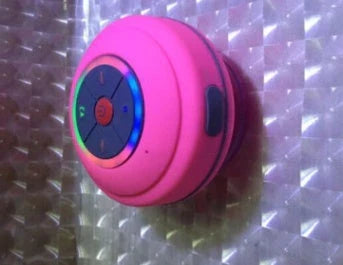 Mini Waterproof LED Speaker with Bluetooth connectivity and hands-free calling feature