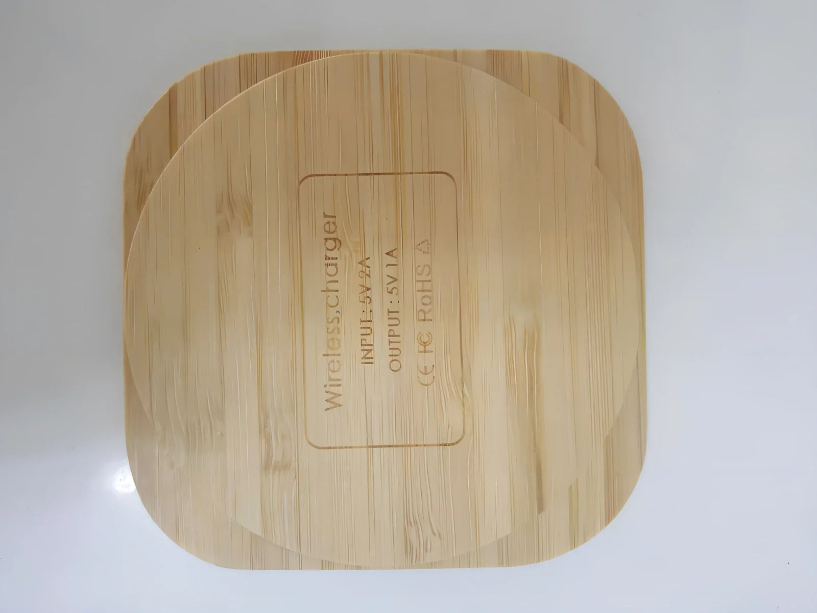 Square wooden bamboo 5W wireless charger in brown, 92x92x8mm with green charging indicator