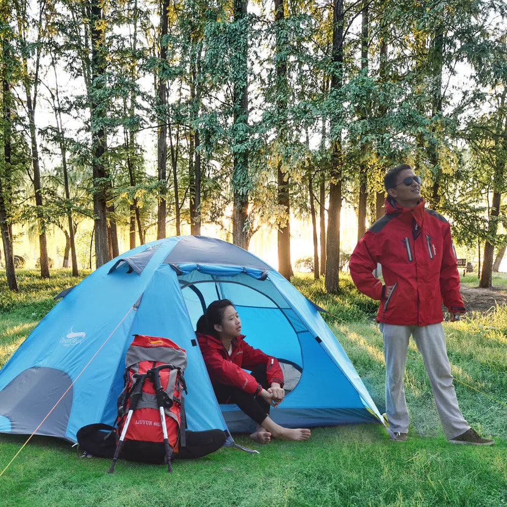 Wild couple tent in fruit green with spherical plaid outer and aluminium frame set up on grass