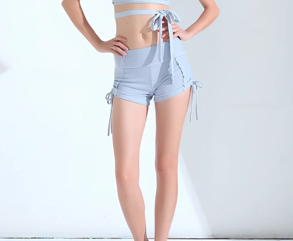 Women's black slim yoga pants shorts, size M with 65 cm waist and 27 cm length for running