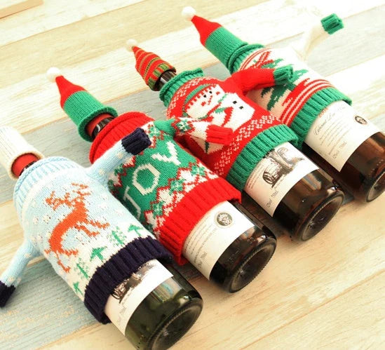Knitted Christmas Bottle Set with festive designs including Joy, Christmas tree, elk, and snowman